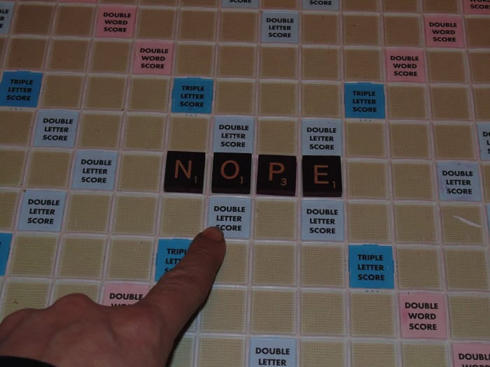 NEVER, EVER make your first play to open up a vowel to your opponent that is on the double letter score. Doing this would give them an advantage right out of the gate.