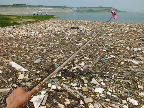 Floating garbage on Yangtze River in the upper reaches of Three Gorges Dam, in Yichang, Central China's Hubei province.