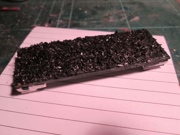 This is a coal load I made for a kit-built hopper wagon, using coal from a lump I liberated from the pile at North Woolwich Old Station Museum (still got enough for ten more at least - or loco tenders)