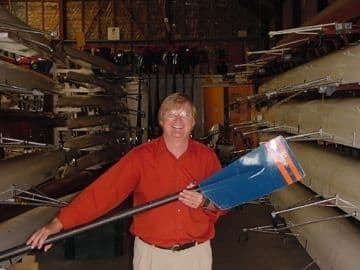 Shown above is Dr. Dale Coleman, of Auburn University, holding a regetta racing oar in Grosvenor boat house in Chester, England.