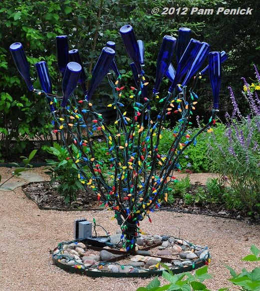 There are many ways people are adapting this African tradition in urban America.I saw one garden where each piece of cobalt blue glass, including saucers and plates are staked into the ground throughout the garden.