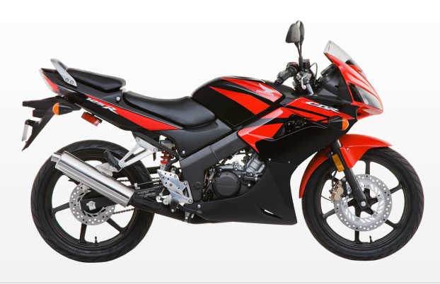 Waaaaaay down on the price scale from the Husky and Aprilia, this 2009 Honda CBR125R is still one buck under three grand!