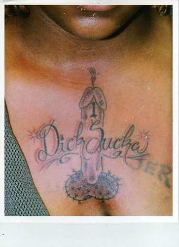 Here we have a lovely chest piece describing the owner’s prowess as a number-one dick sucka. I’m not sure if she needed to go through some kind of competition to be the winner of this accolade, but I’m glad I wasn’t a judge!