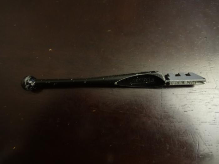 This is a glass cutter which can be a gift for the guitar player to make his own slide or you can use it to make him a slide. It's not really easy, but if you take your time...