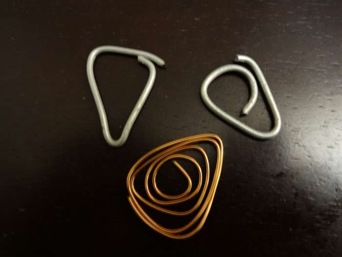 Try other types of materials like wire, and you might find some cool crafty ways to make guitar picks.
