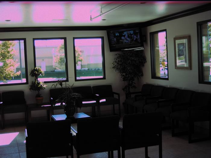 Comfortable chairs and a television are available for you while you wait for your car to finish being washed at the California Oaks Car Wash.
