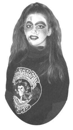 Ghoulish monster makeup on a teen girl, grateful dead zombie costume with home made face paint