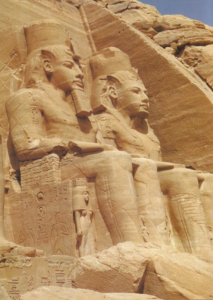 Ramesses' greatest monument is the huge temple carved from the natural sandstone rock at Abu Simbel, far to the south in Nubia. Two of the four pairs can be seen seated in the picture above