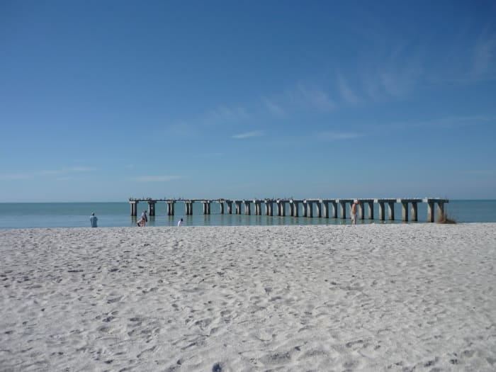 The skeleton of the old Florida Power and Light pier -- now a favorite roosting spot for hundreds of pelicans and other sea birds. Can you see them? -- those dots on top.