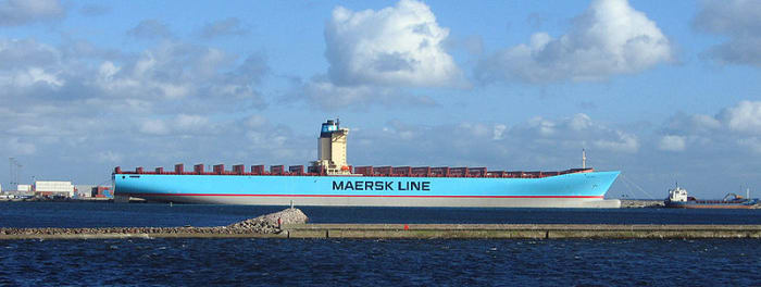 Emma Maersk - currently the largest container ship on earth. Look at how small the ship next to it look. Image credit: Wikipedia Commons.