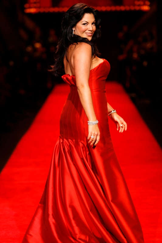 Sara Ramirez modeling at the Red Dress Collection charity fashion show to benefit The Heart Truth.
