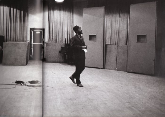 Monk wistfully waltzing around the studio. This picture of Monk listening to the playback was taken around 1962 or 1963.