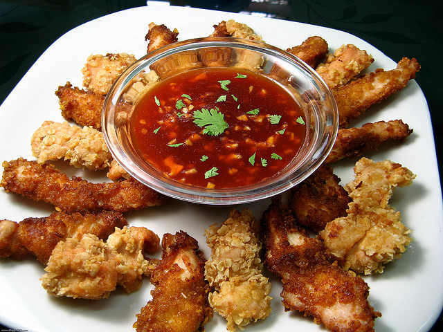 Flatten chicken with the meat mallet to make chicken strips.