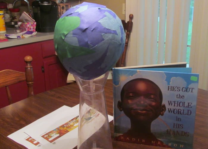 We display ours in a fun vase as a reminder that God made the world and He loves the world.