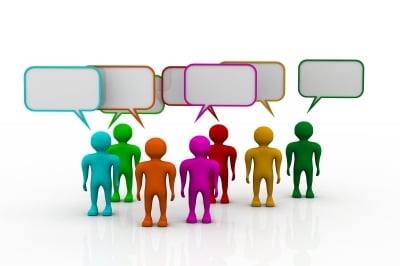 A class of ESL students talking to each other.