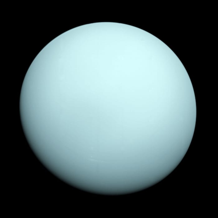The lopsided giant - Uranus also has rings (although not visible in this shot taken by Voyager 2 in 1986) and the brightest clouds in the solar system