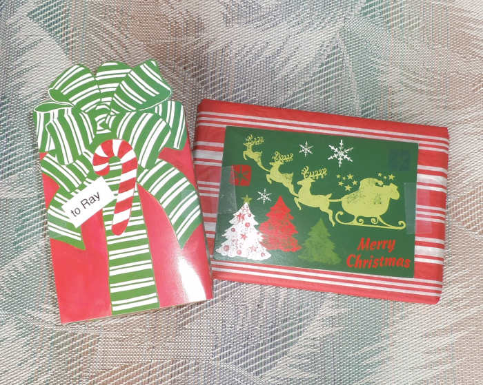 I've decorated these packages with last year's Christmas cards. They look festive and are easy to pack for shipping (no bows).