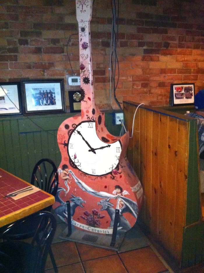 This guitar can now be found inside Brewery Bay (A restaurant and bar) on Mississauga Street in Orillia.