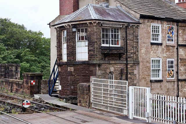 The quaint listed signal cabin at Knaresborough Station looks like an 'add-on' to the end of a neighbouring building