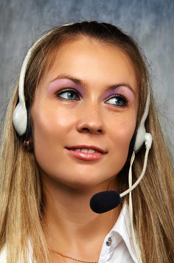 Call Centre female with free hands, headphone and microphone. Having the right equipment can help towards making successful calls.
