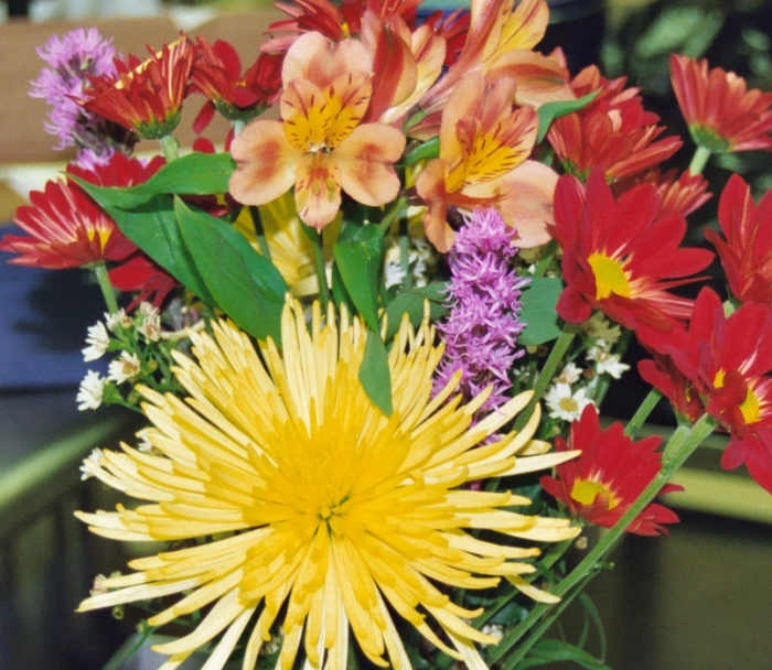 A colorful arrangement brings sunshine to the life of the woman who celebrates her special day.