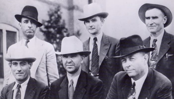LEFT TO RIGHT, STANDING: Ted Hinton, Prentiss Oakley & B.M. "Maney" Gault SITTING: Bob Alcorn, Henderson Jordan and Frank Hamer