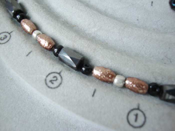 Along with the magnetic beads, I have used silver glass accent beads, black accent beads, and glass textured faux pearl beads.