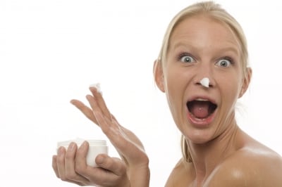 Use your moisturizer sparingly by dotting around the face and massage in gently using facial massage movements.