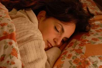 This sleeping girl looks cozy now, but ask her how she feels when she's 50 or 60. Photo: Danilo Rizzuti