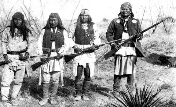 Apache warrior Geronimo (right) and his warriors from left to right: Yanozha (Geronimos´s brother-in-law), Chappo (Geronimo´s son of 2nd wife) and Fun (Yanozha´s half brother) in 1886. Note the size of Geronimo compared to the other warriors.