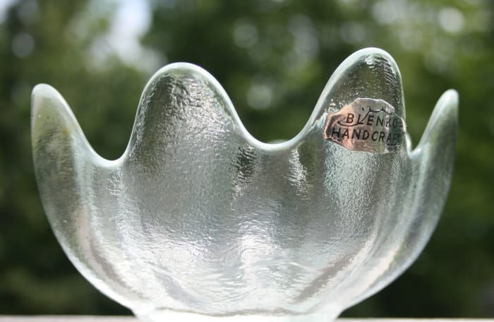 This older piece of Blenko (probably from the '70s) is a salad bowl that bears a silver foil sticker.