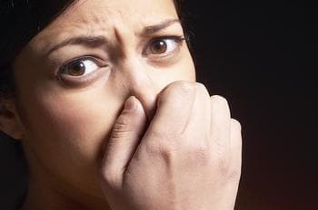 There's no need to tell a guy he smells. Trust me, if he's smart, he already knows. If he's not smart, well then...