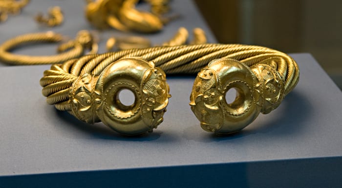 Gold Celtic torc found at Snettisham, Norfolk - likely Iceni work represents twisted rope and Knotwork (see below) - on exhibition at the British Museum, London WC1