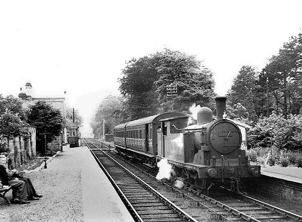 Eastbound Class G5 pulls into Hutton Gate Station with a two coach train of ex-North Eastern Railway non-corridor eliptical-roofed stock, the nearer being a brake 3rd - re-classified 2nd in BR days