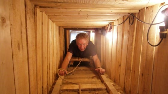 Tunnel reconstruction of 'Harry' - power for the lights was taken from the camp circuit, wood for tunnel supports, 'tracks' and 'trollies' from the bunks