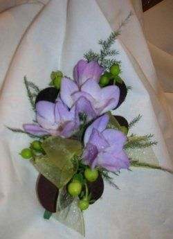 Floral tape holds this little corsage together and seals moisture in the cut ends of the stems.