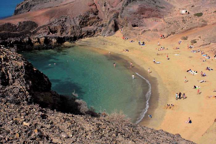 The natural cove of Playa de Papagayo. Even in February when this photo was taken, the beach was beginning to fill up