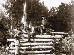 A Signal Station and Signal Team - an officer peers through his telescope to see the signals sent his way