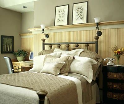 beautiful plate rail / chair rail used to hold pictures in the bedroom