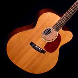 Acoustic guitar with a 'cutaway'. The indentation allows easier access to the upper frets on the treble strings.