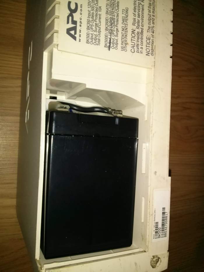 View from above with the battery installed before re-inserting the cover panel and placing the unit right-side up.