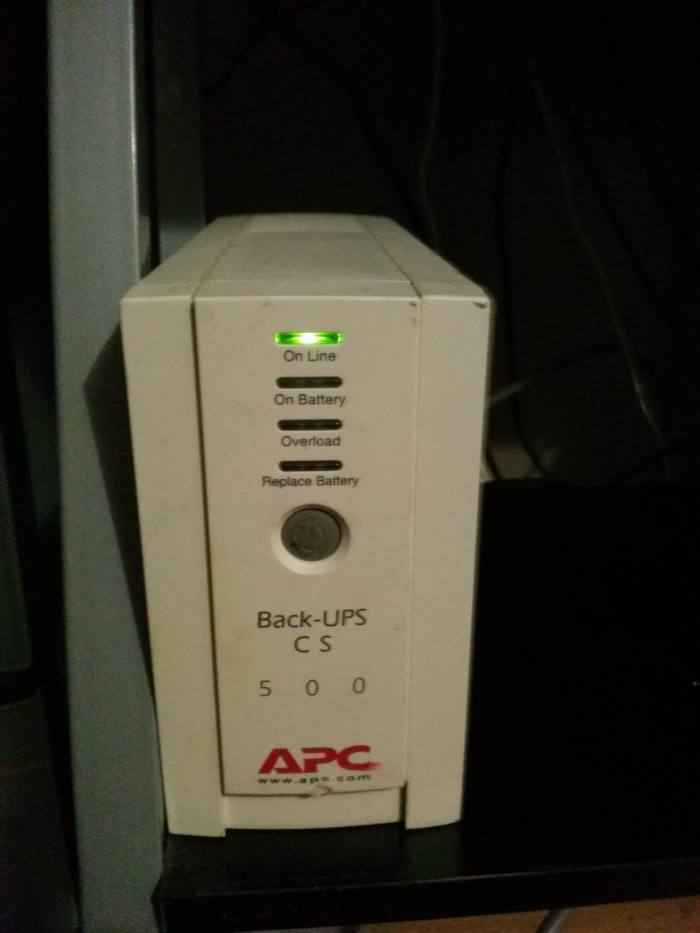 Back-UPS unit plugged in with a good battery, quietly charging. Hooray for no more alarm squeals!