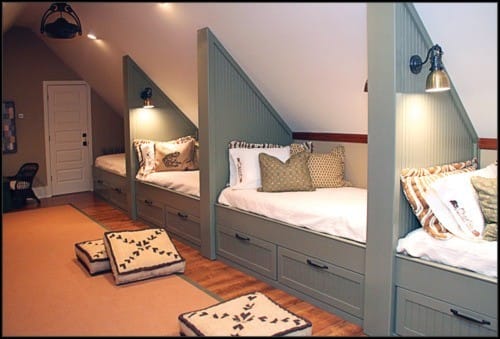 Make the best use of cape cod roof lines with tucking bed under the slanted roof line - Attic Bed Rooms