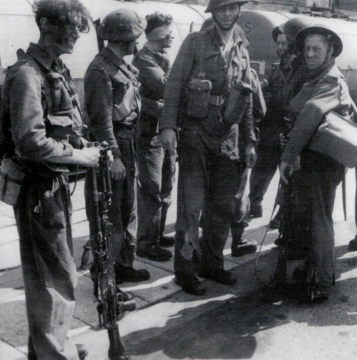 Men of Commander Ian Fleming's No 3 Commando disembark at Newhaven after being transported back from Dieppe