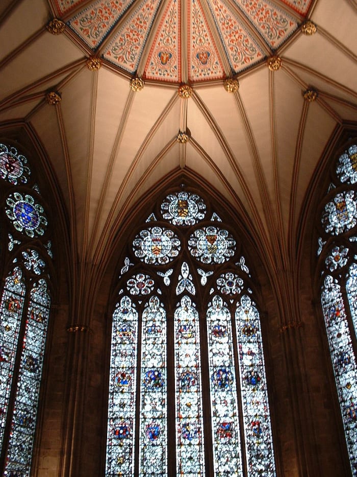 Windows in the Chapter House at York Minster show the equilateral arch with typical circular motifs in the tracery.