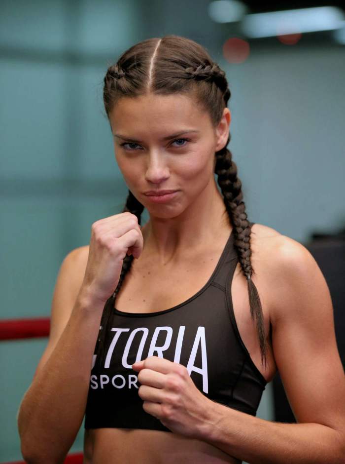 Adriana Lima hosting an event called Train Like an Angel. It seems she is getting ready to do some boxing practice.