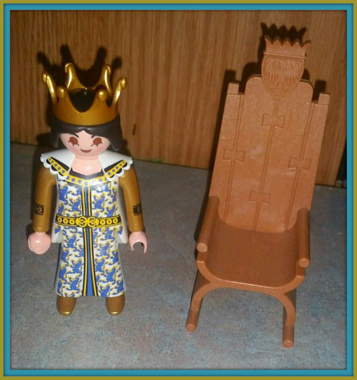 Beautiful Playmobil Medieval Queen & Throne from the Lion's Castle. She is wearing a nice crown that matches her gown and sits in the thrown very nicely.