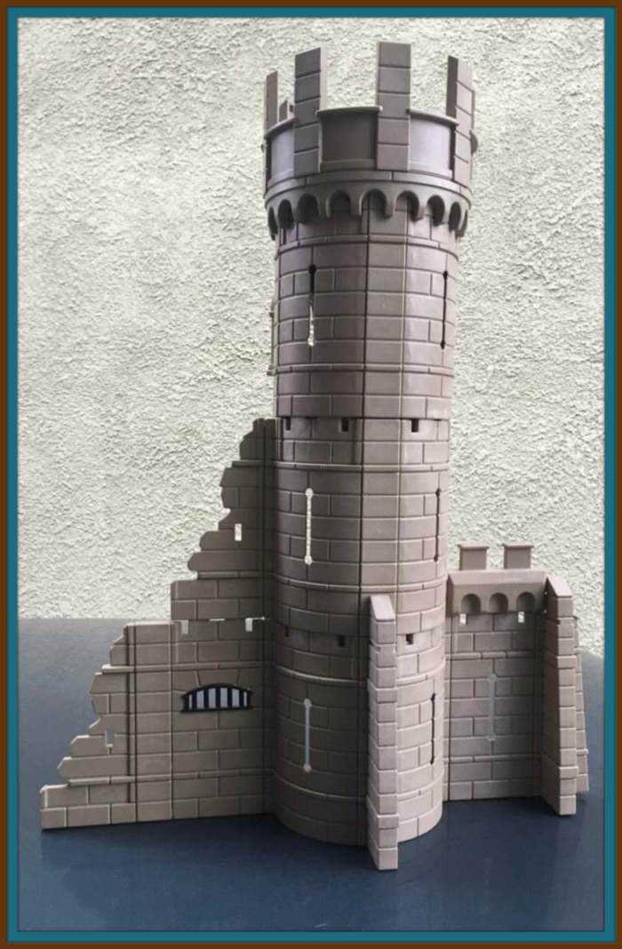 Playmobil Knights Castle Defense Tower, A lovely gray in color, and three levels tall. It is a custom creation & does not have a model number. This is an older style of Playmobil castle with connectors known as the click together building system.