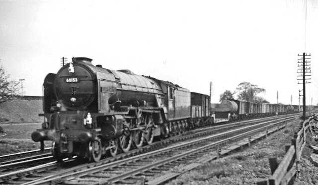 Near the same place, Peppercorn A1 Pacific 60153 'Flamboyant'' (named after a racehorse) also heads down to the Low Level line for Teesside with a freight off the main line