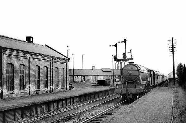 Looking the other way, with Class A3 Pacific heading a passenger working towards Leeds via Ripon and Harrogate past the locomotive depot